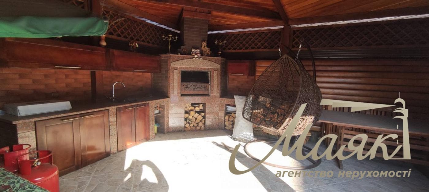 Сучасний будинок 235 м² із сонячними панелями, гаражем, дизайнерським ремонтом та ділянкою 9,8 соток!